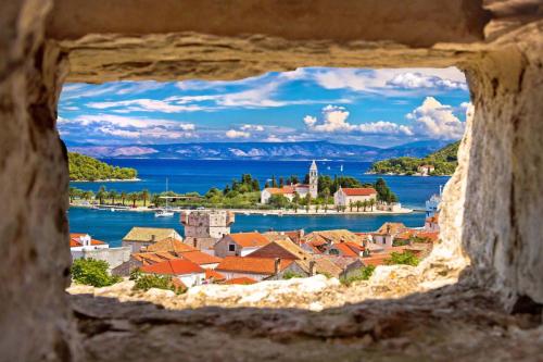 Vis,Island,Bay,Waterfront,View,Through,Stone,Window,,Dalmatia,,Croatia